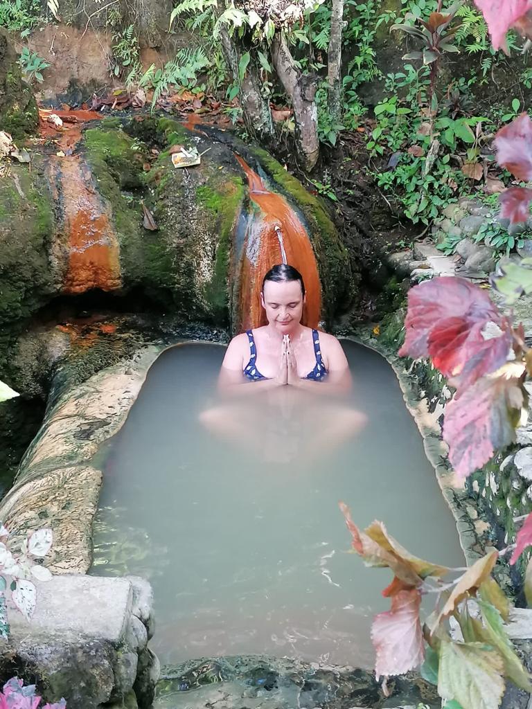 Receiving the earth's medicine in a natural hot spring